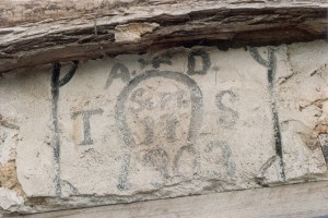 Thomas Stanton put his initials and date in the grouting around a stone above the west stable door.